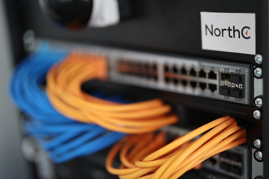 A network switch with cabling patched into it.